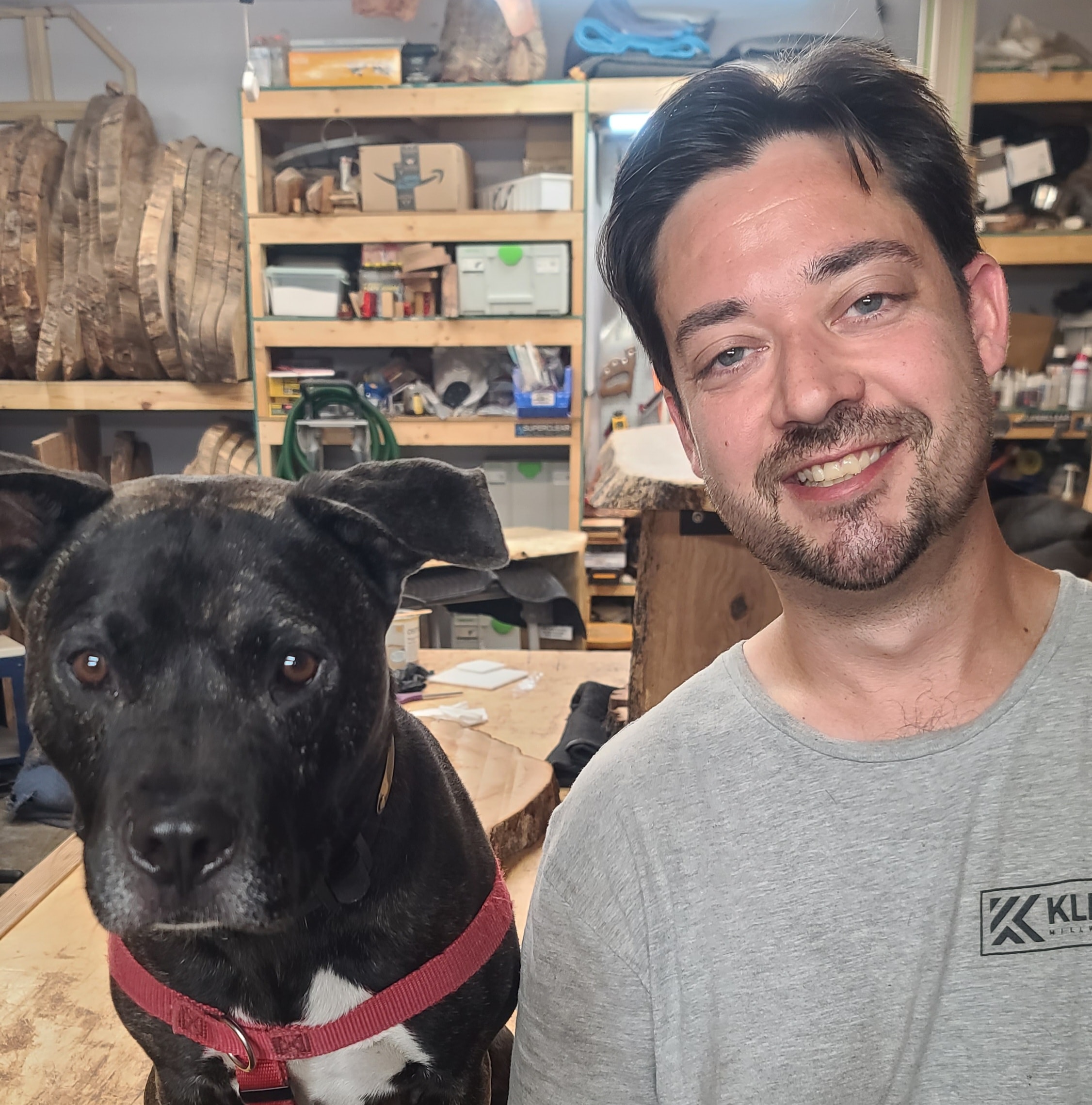 Bryan Klein in the workshop with his dog Duke